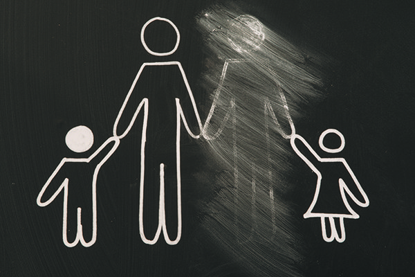 parental alienation - broken family on a blackboard