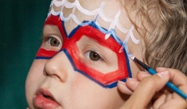 Child in a mask | Featured image for the When Can You Change Your Childerns Surname? blog from Barton Family Lawyers.